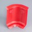 Angle interne rouge pour plinthe PVC à lèvres souples avec bouchons insérés