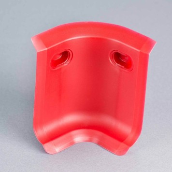 Angle interne rouge pour plinthe PVC à lèvres souples sans bouchons
