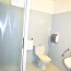 Salle de bain d'un hôtel avant rénovation