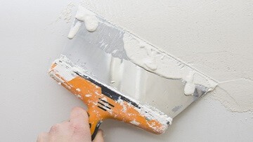 Couteau avec enduit de rebouchage