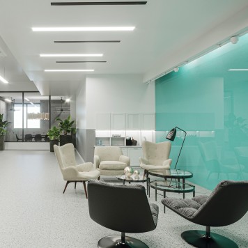 Réalisation paroi salle d'attente avec panneau mural décoratif brillant Vert Jade "Sheer Glass" Altro Whiterock Chameleon