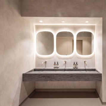 Toilettes hôtel réalisées avec panneau PVC effet Béton Gris Clair ou Pierre Grise